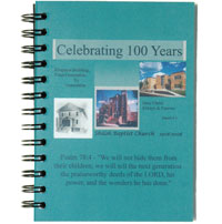 a customized wirebound journal with a clear poly cover over a full-color topsheet celebrating a church'a 100th anniversary