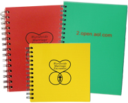 spiral journal with an opaque red poly cover, yellow poly cover customized with the Marriage Encounter logo and two color customized green poly cover