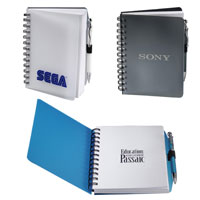 three poly cover spiral journals with clear, gray and blue covers
